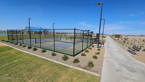 a view of a tennis court with basket ball court