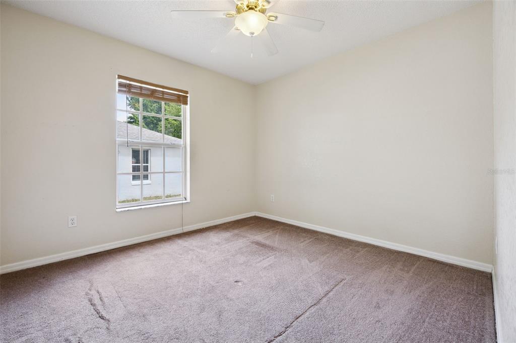 124 Diamond Ridge Boulevard Auburndale, FL 33823 - Photo 14 of 20 an empty room with a window