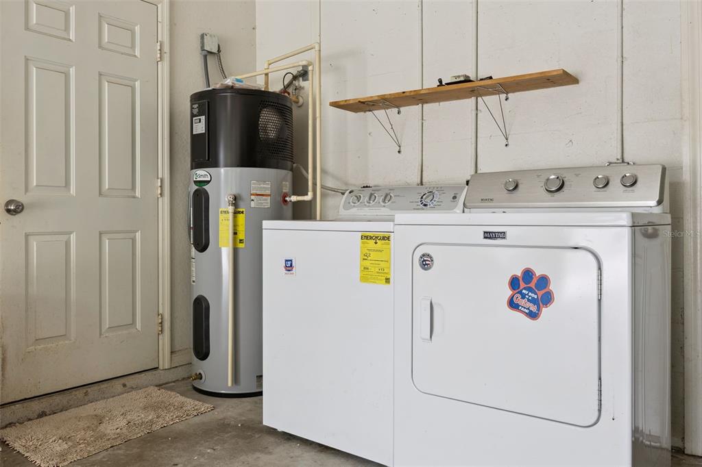 124 Diamond Ridge Boulevard Auburndale, FL 33823 - Photo 17 of 20 a utility room with dryer and washer