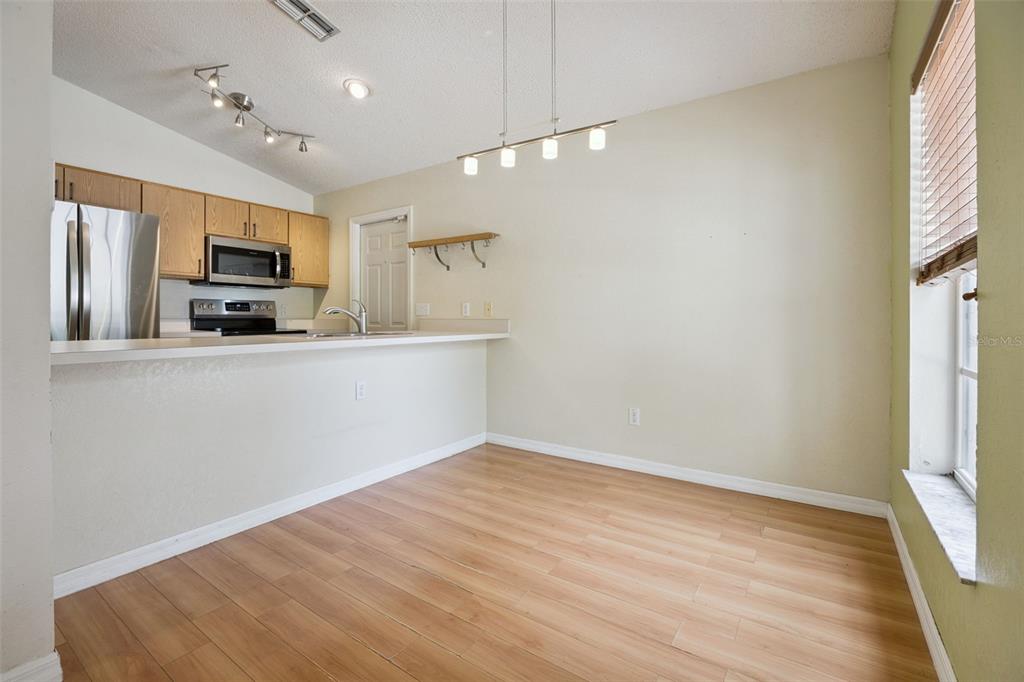124 Diamond Ridge Boulevard Auburndale, FL 33823 - Photo 6 of 20 a view of a kitchen with a sink and a window