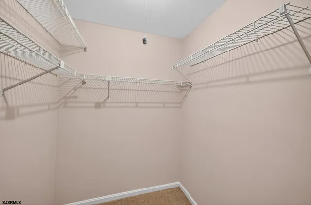 a view of a room with racks on the wall