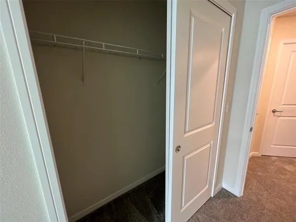 a bathroom with a sink a mirror and a shower