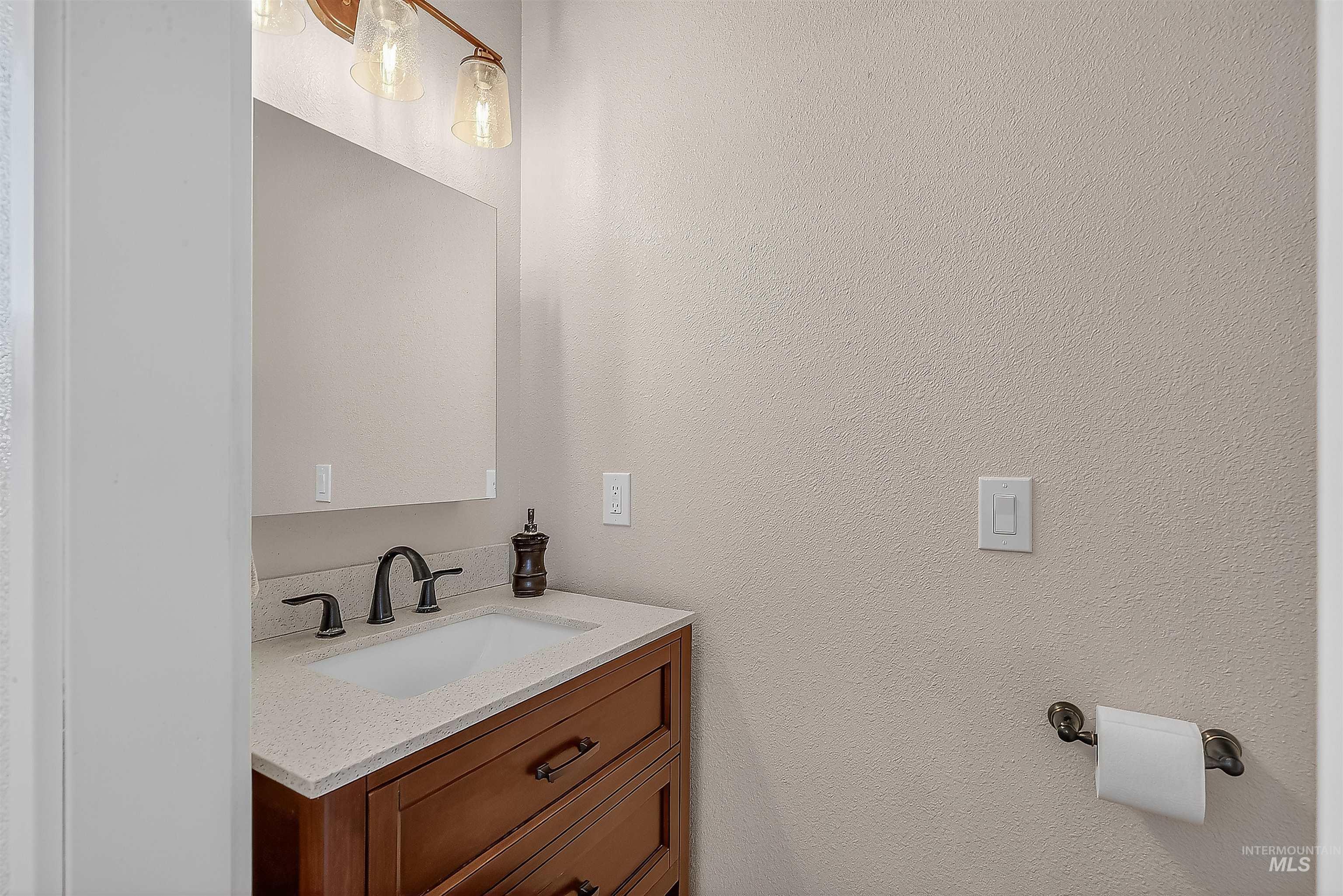 2233 Burrell Avenue Lewiston, ID 83501 - Photo 19 of 48 Bathroom featuring vanity and a textured wall