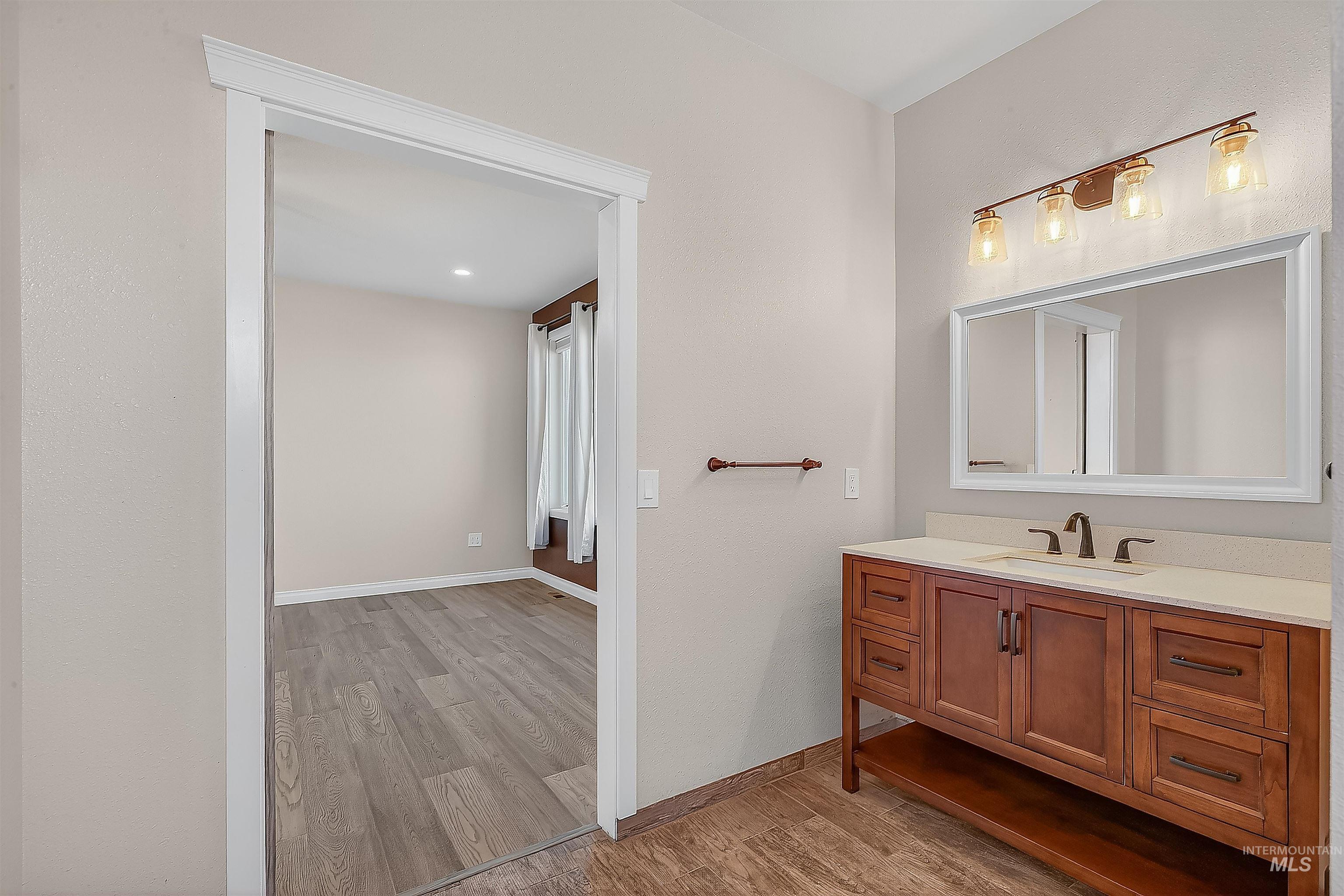 2233 Burrell Avenue Lewiston, ID 83501 - Photo 20 of 48 Bathroom featuring vanity and light wood finished floors