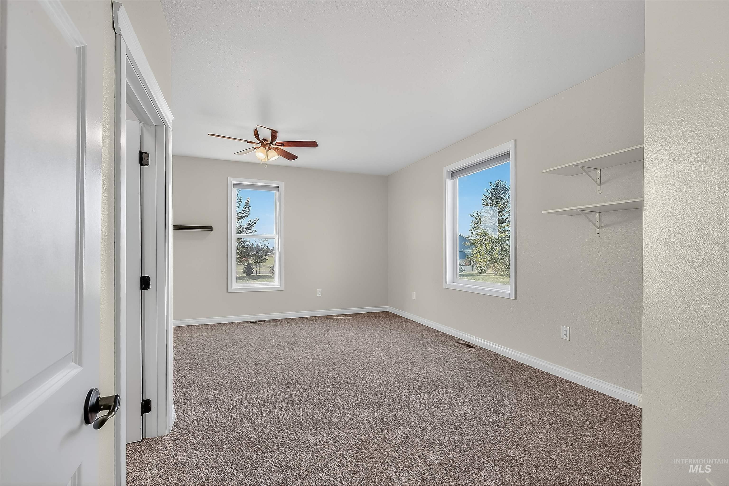 2233 Burrell Avenue Lewiston, ID 83501 - Photo 21 of 48 Unfurnished bedroom featuring light colored carpet and a ceiling fan