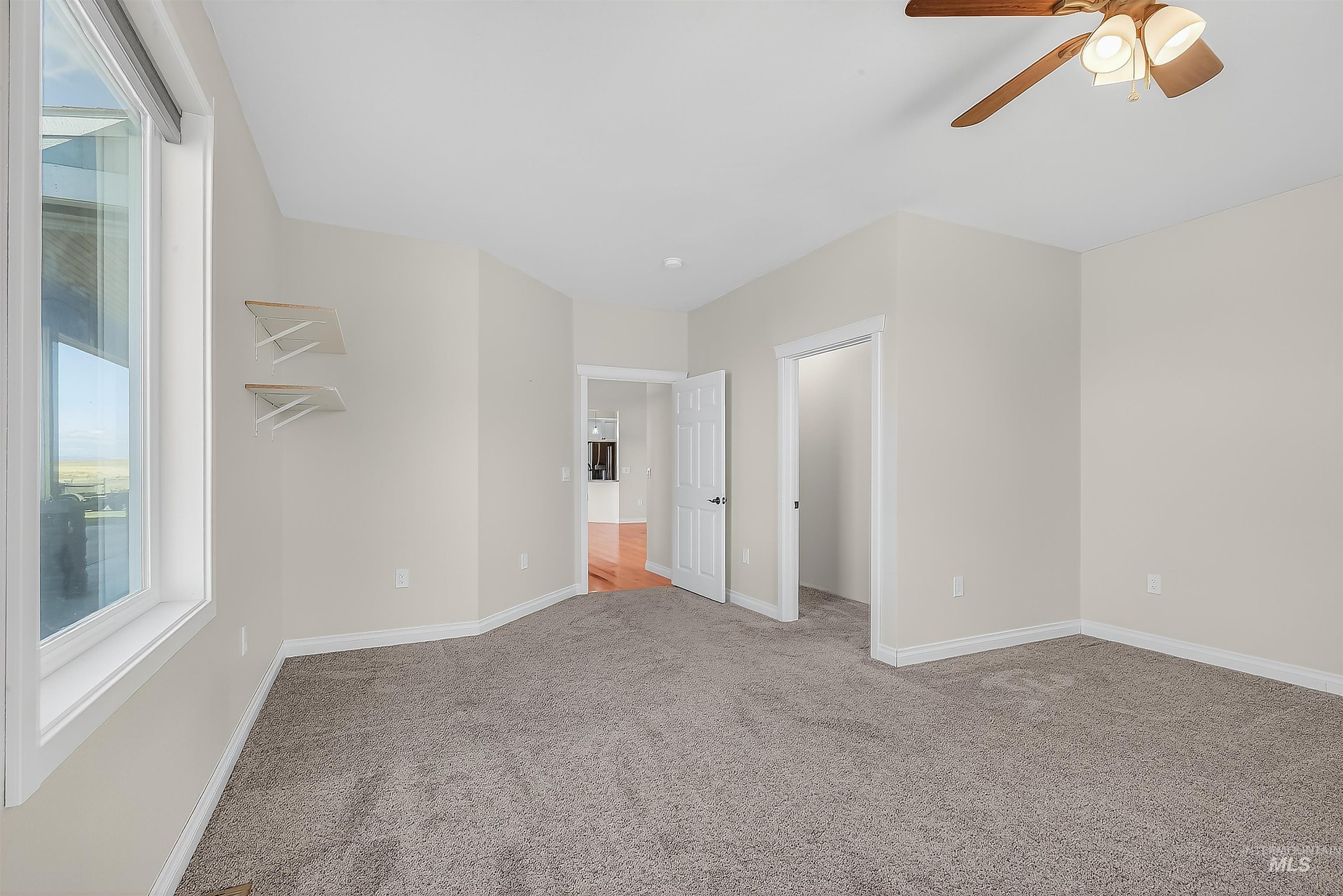 2233 Burrell Avenue Lewiston, ID 83501 - Photo 22 of 48 Unfurnished bedroom with light carpet and a ceiling fan
