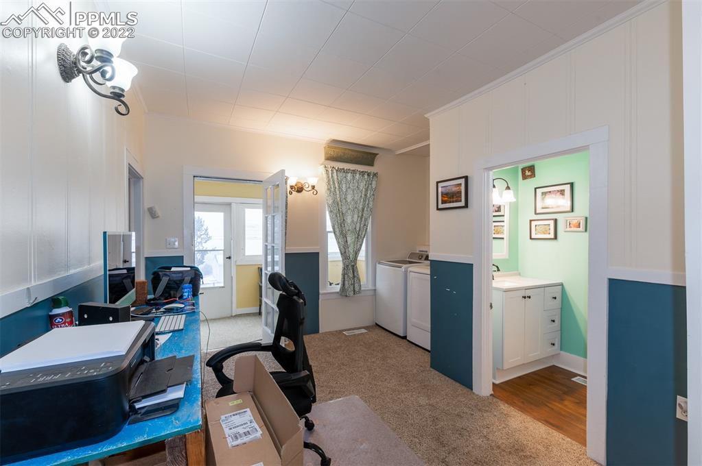 210 South 2nd Street Victor, CO 80860 - Photo 22 of 30 a view of a workspace with furniture and window