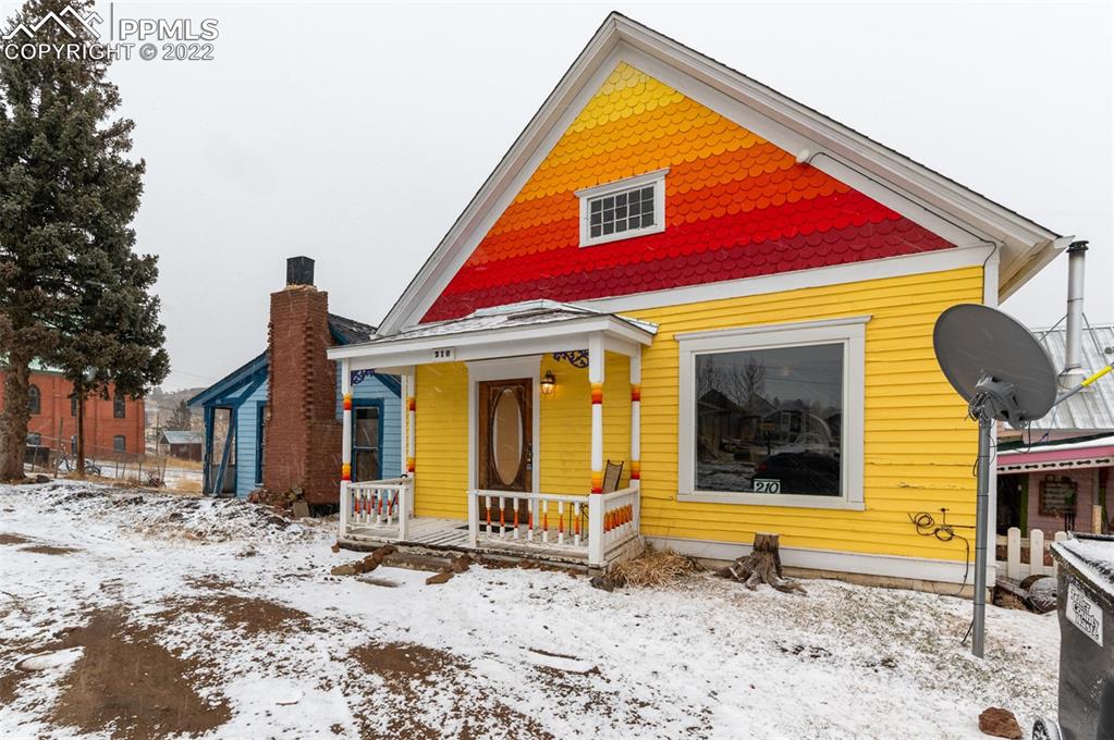 210 South 2nd Street Victor, CO 80860 - Photo 3 of 30 a view of a house with a yard