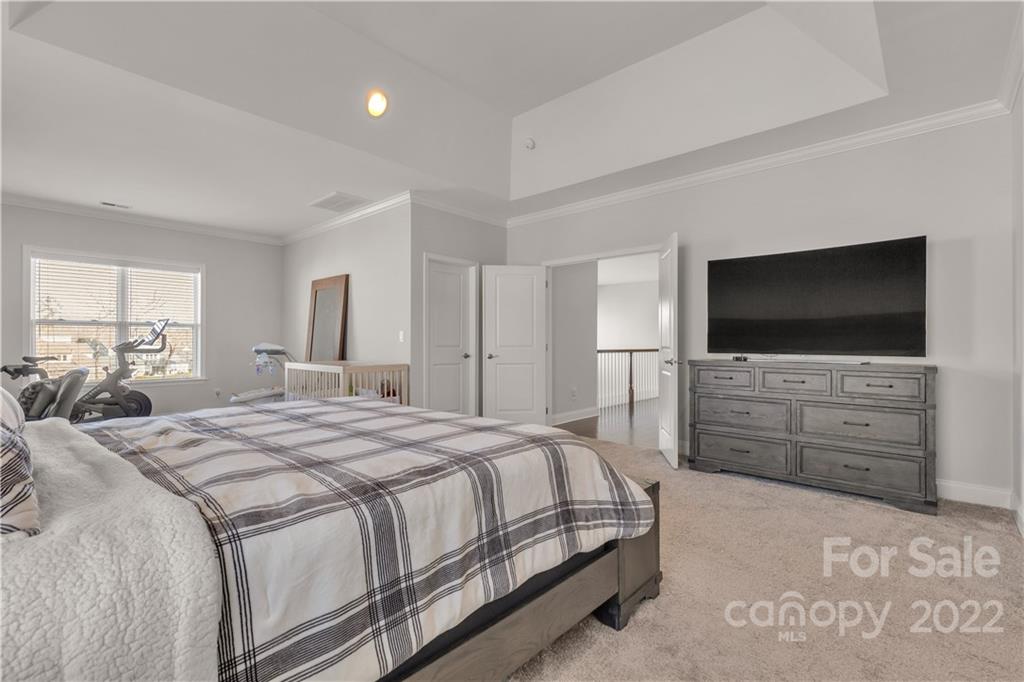 6028 Candlestick Lane Lancaster, SC 29720 - Photo 20 of 34 a bedroom with a bed room tv and a window