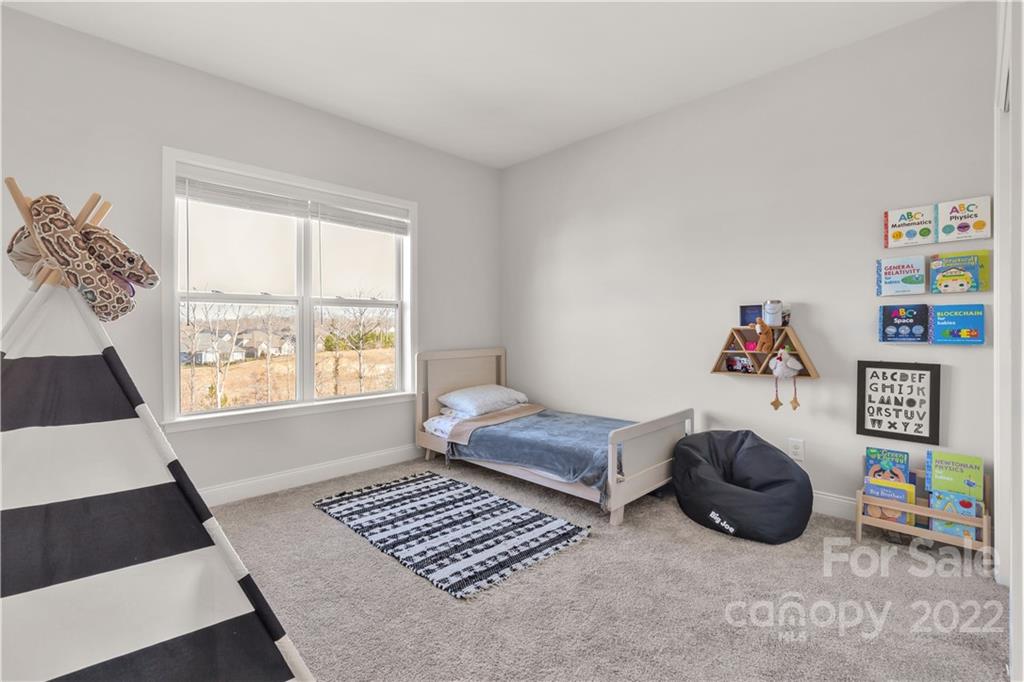 6028 Candlestick Lane Lancaster, SC 29720 - Photo 25 of 34 a bedroom with furniture and a window