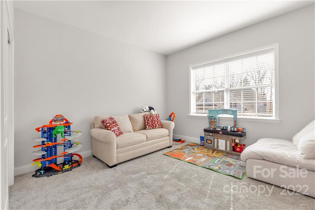 6028 Candlestick Lane Lancaster, SC 29720 - Photo 27 of 34 a living room with furniture and a window