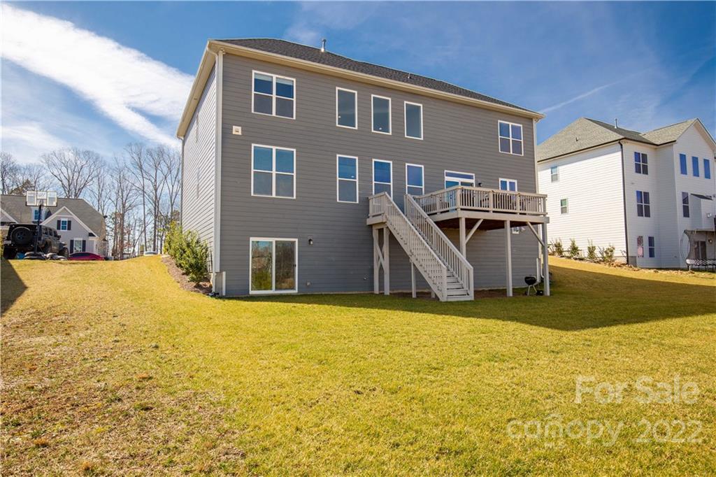 6028 Candlestick Lane Lancaster, SC 29720 - Photo 31 of 34 a front view of a house with a yard