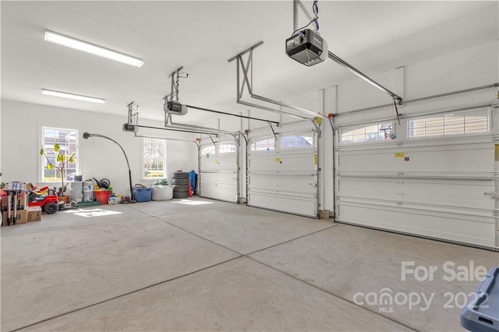 6028 Candlestick Lane Lancaster, SC 29720 - Photo 34 of 34 a view of a garage with shelves