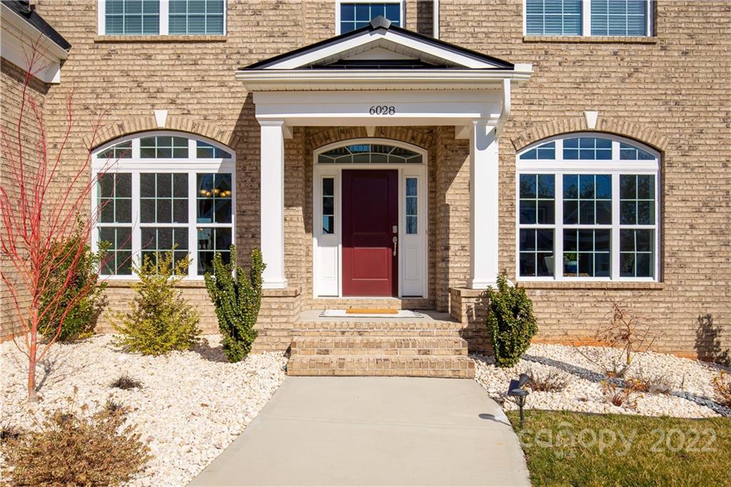 6028 Candlestick Lane Lancaster, SC 29720 - Photo 4 of 34 a front view of a house with a yard