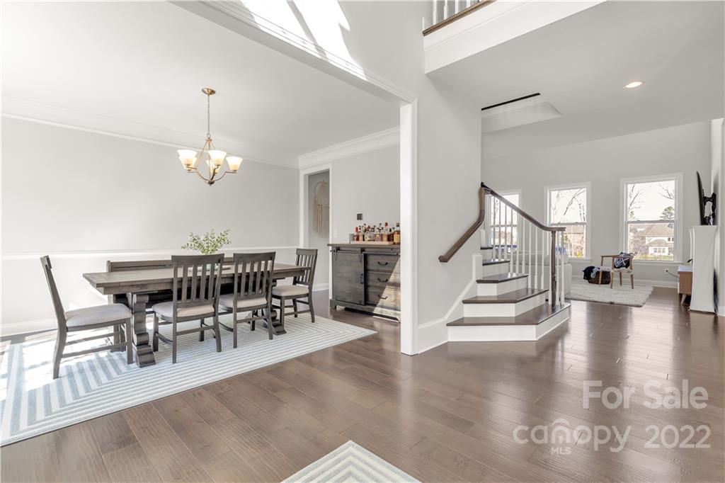 6028 Candlestick Lane Lancaster, SC 29720 - Photo 5 of 34 a dining room with furniture entryway and wooden floor