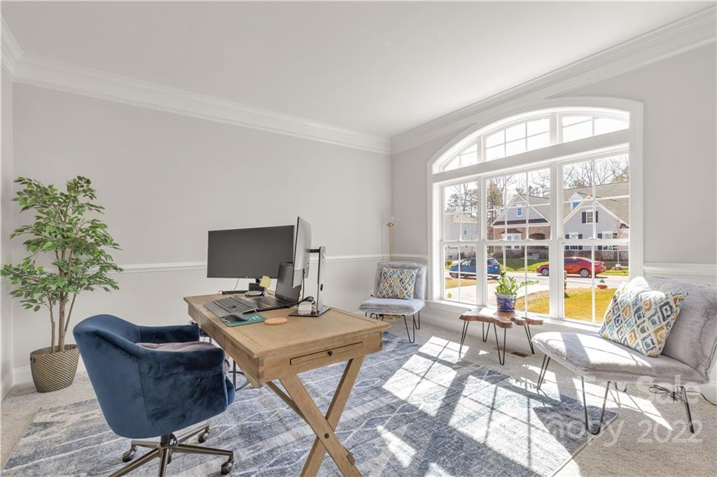 6028 Candlestick Lane Lancaster, SC 29720 - Photo 8 of 34 a work room with furniture and a potted plant