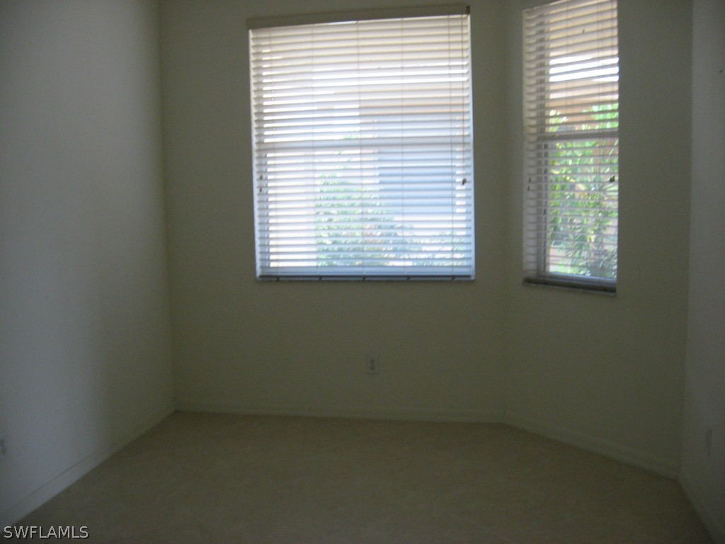 4676 Fairloop Run Lehigh Acres, FL 33973 - Photo 18 of 21 a view of a small space with a window