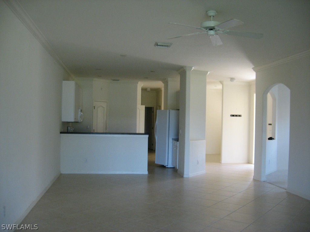 4676 Fairloop Run Lehigh Acres, FL 33973 - Photo 21 of 21 a view of a hallway with closet