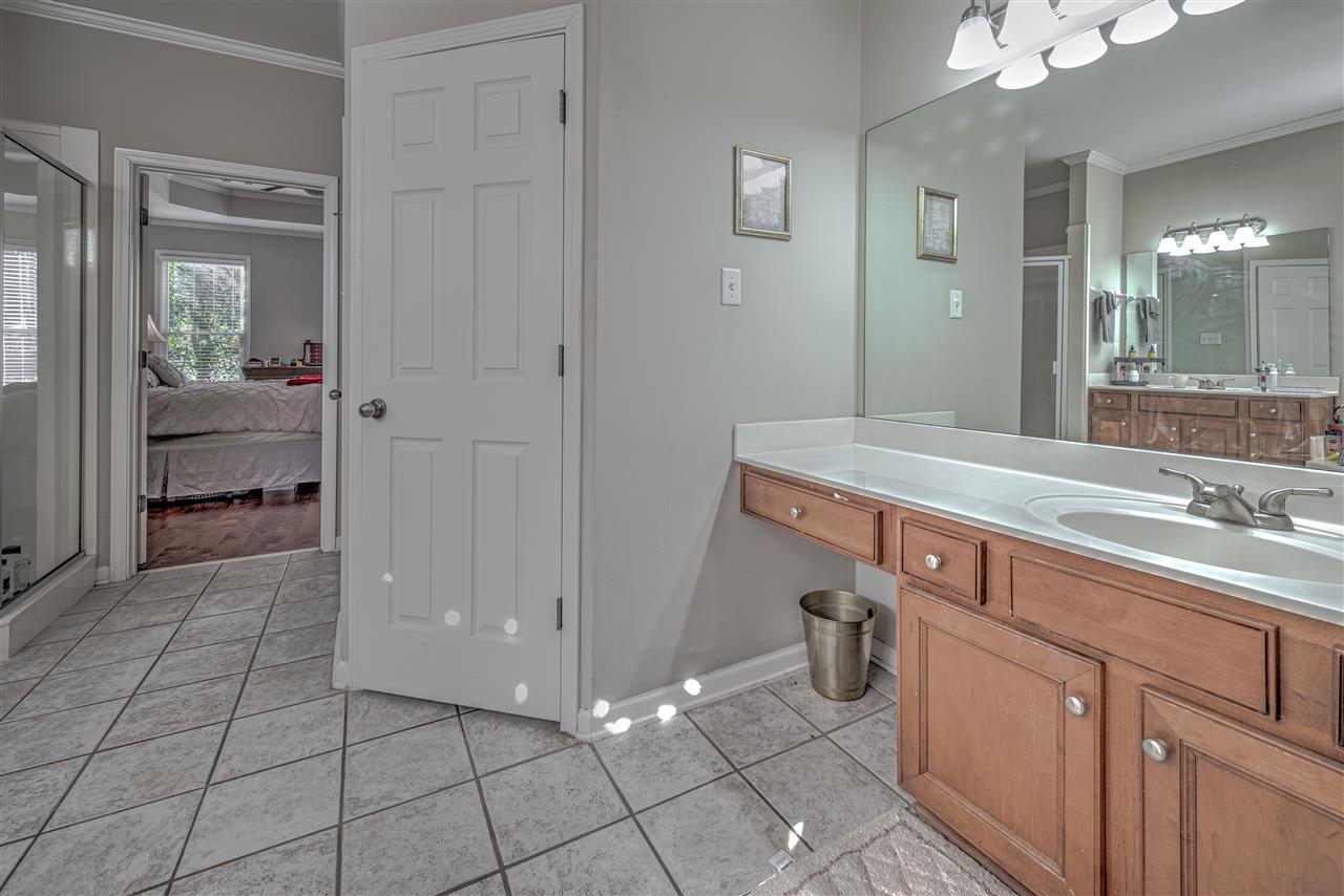 10388 Pilot Rock Road Collierville, TN 38017 - Photo 13 of 24 Features 2 separate vanities, each with 2 drawers, privacy toilet room and linen closet.