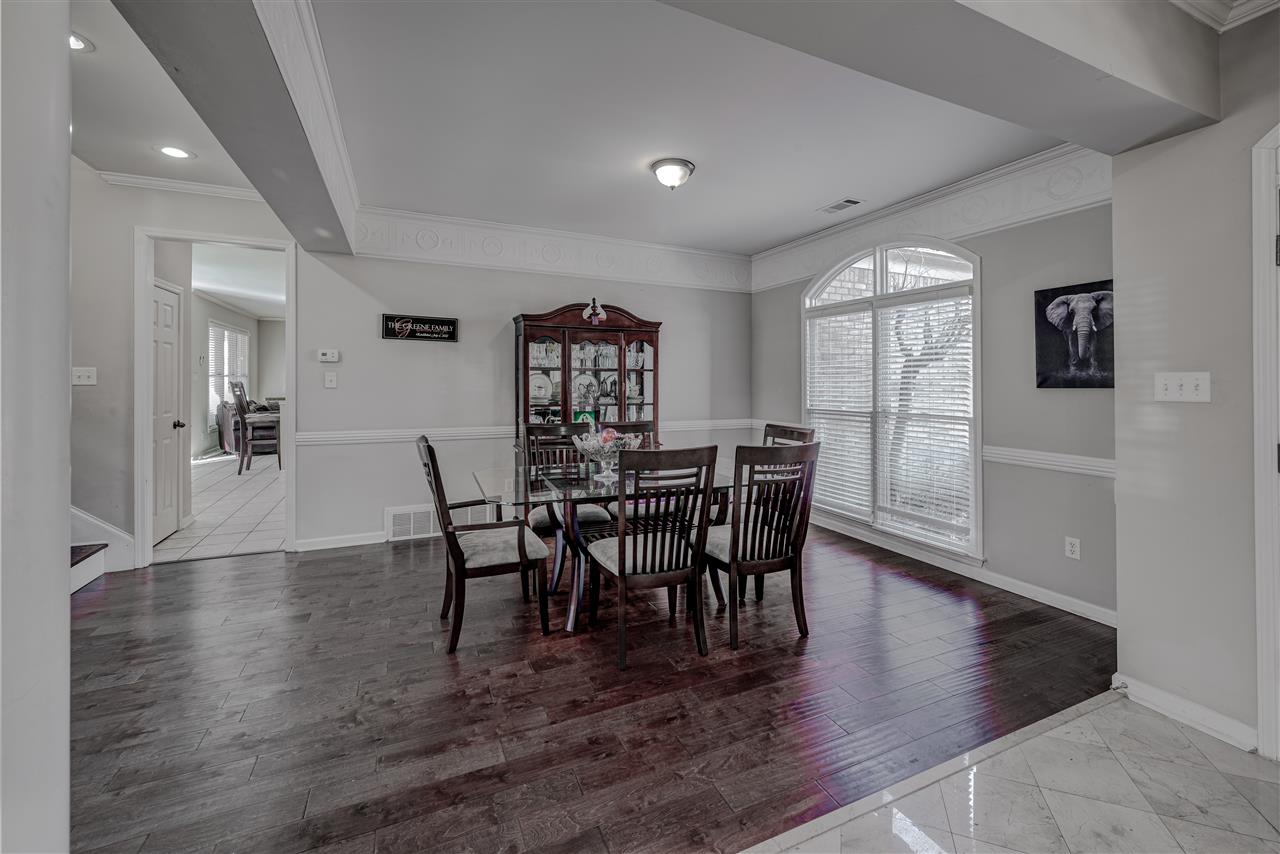 10388 Pilot Rock Road Collierville, TN 38017 - Photo 5 of 24 9 ft. ceiling with crown molding featuring wide plank custom hardwood floor.