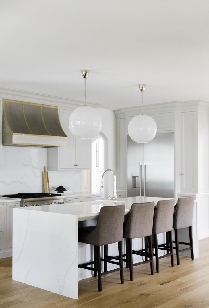 240 West Tower Road Barrington, IL 60010 - Photo 14 of 14 a kitchen with a dining table chairs and white cabinets