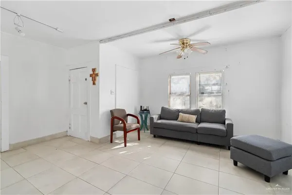a living room with furniture and a window