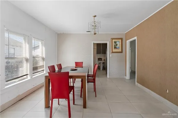 a view of a dining room with furniture window and outside view