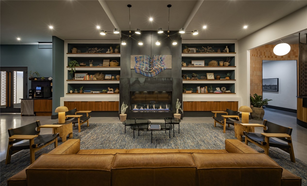 84 East Avenue, Unit 1506 Austin, TX 78701 - Photo 14 of 36 Gather by the fireplace and enjoy an elixir of choice.