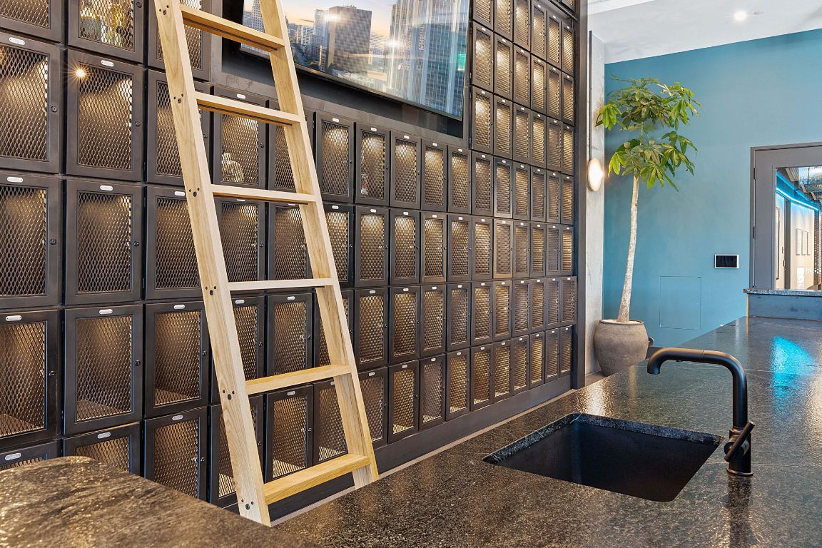 84 East Avenue, Unit 1506 Austin, TX 78701 - Photo 15 of 36 Private liquor lockers in Vesper's lobby add a touch of sophistication to your gatherings.