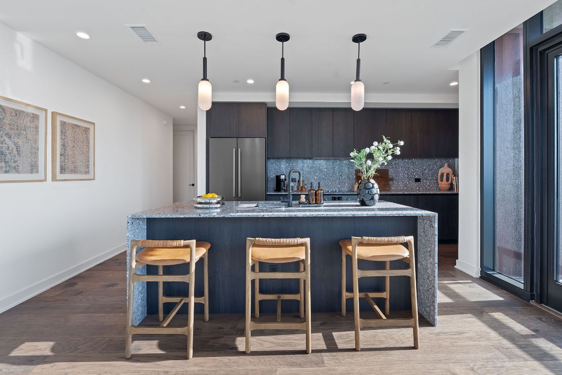 84 East Avenue, Unit 1506 Austin, TX 78701 - Photo 2 of 36 Representative Photo. Unit 1506 features the Industrial Rainey scheme which includes Italkraft carbon marine wood Italian cabinetry and terrazzo-quartz countertops.