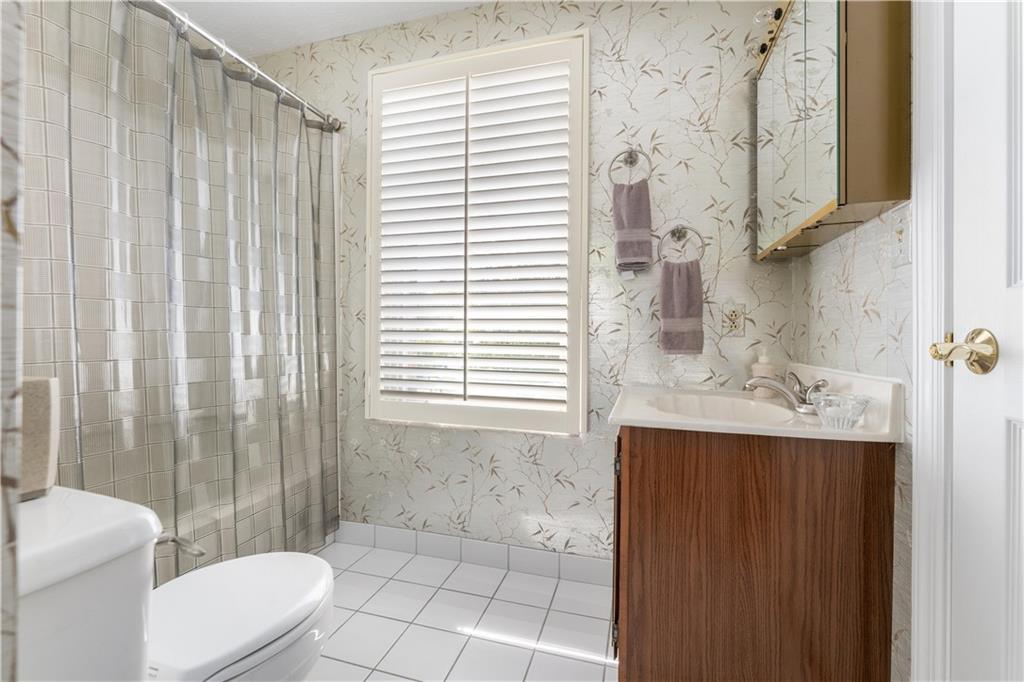 79 Fawnvue Drive McKees Rocks, PA 15136 - Photo 16 of 33 a bathroom with a sink a toilet and shower