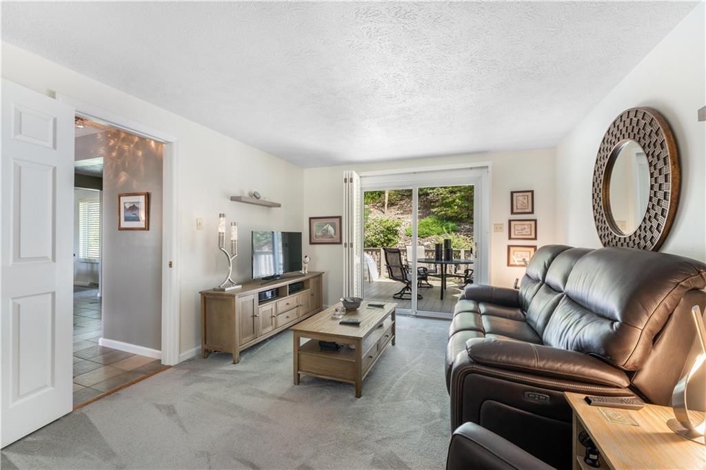 79 Fawnvue Drive McKees Rocks, PA 15136 - Photo 17 of 33 a living room with furniture and a large window