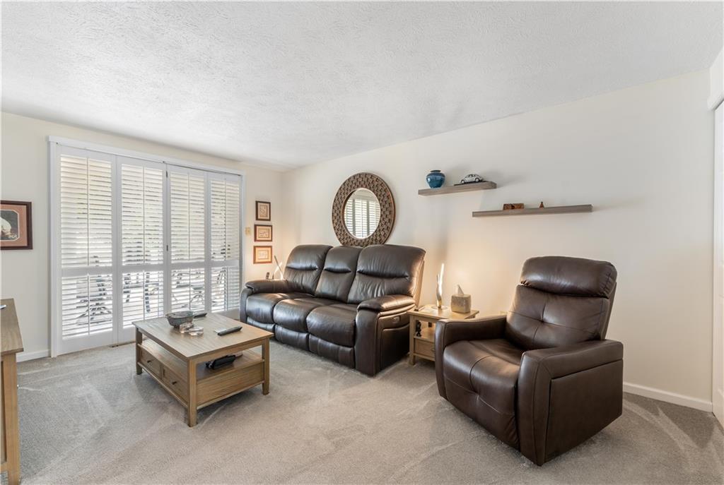 79 Fawnvue Drive McKees Rocks, PA 15136 - Photo 19 of 33 a living room with furniture and a large window