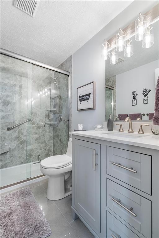 79 Fawnvue Drive McKees Rocks, PA 15136 - Photo 24 of 33 a bathroom with a sink a toilet and shower