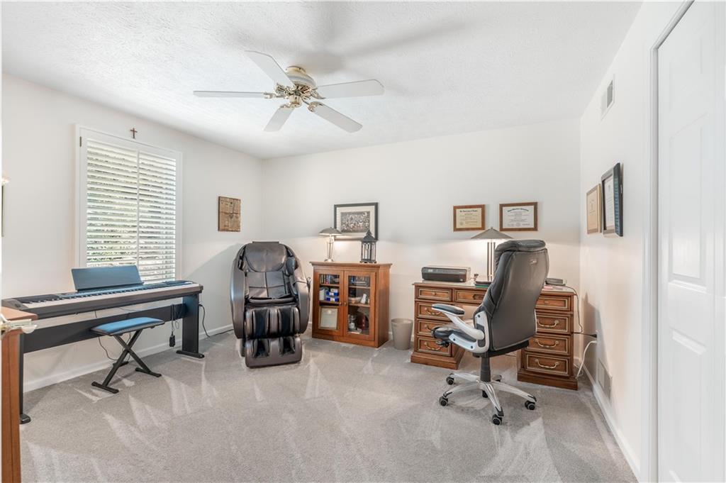 79 Fawnvue Drive McKees Rocks, PA 15136 - Photo 28 of 33 a view of a workspace with furniture and a window