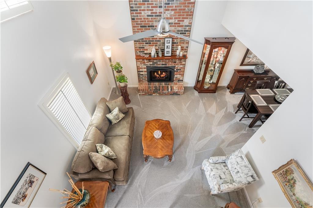 79 Fawnvue Drive McKees Rocks, PA 15136 - Photo 7 of 33 a living room with furniture and a fireplace