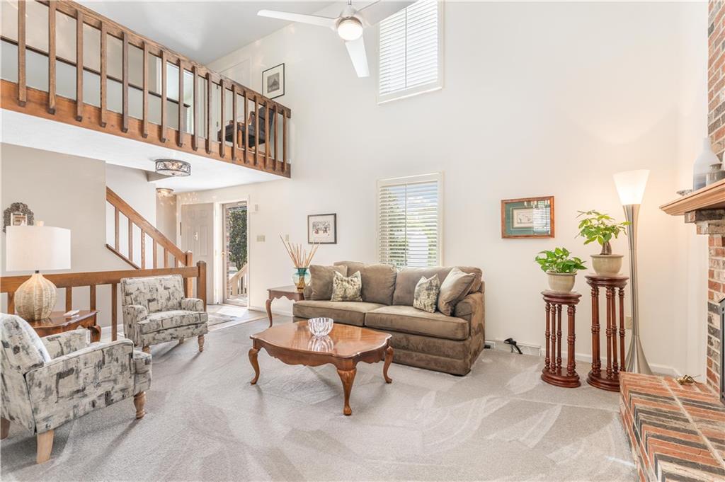 79 Fawnvue Drive McKees Rocks, PA 15136 - Photo 8 of 33 a living room with furniture and a table