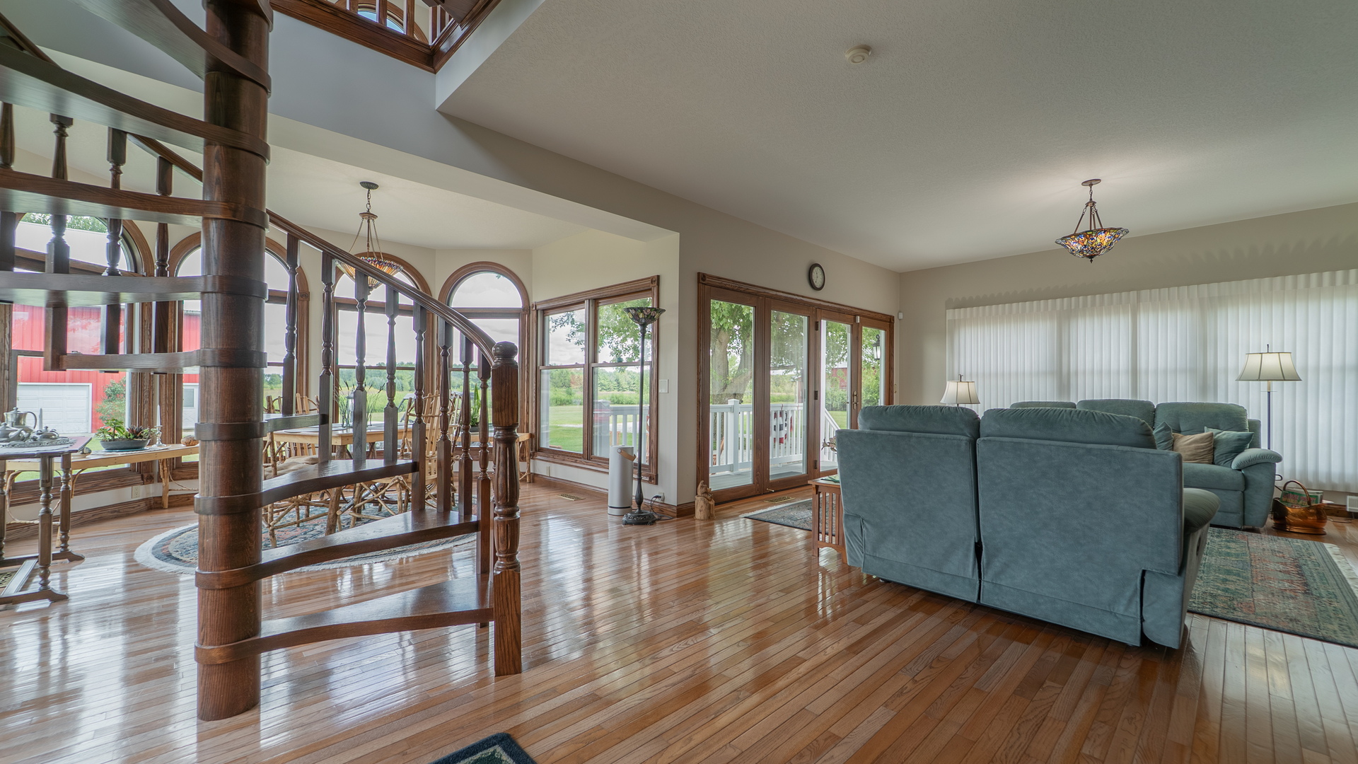 1340 East 2700 North Road Clifton, IL 60927 - Photo 14 of 80 a living room with furniture and a floor to ceiling window