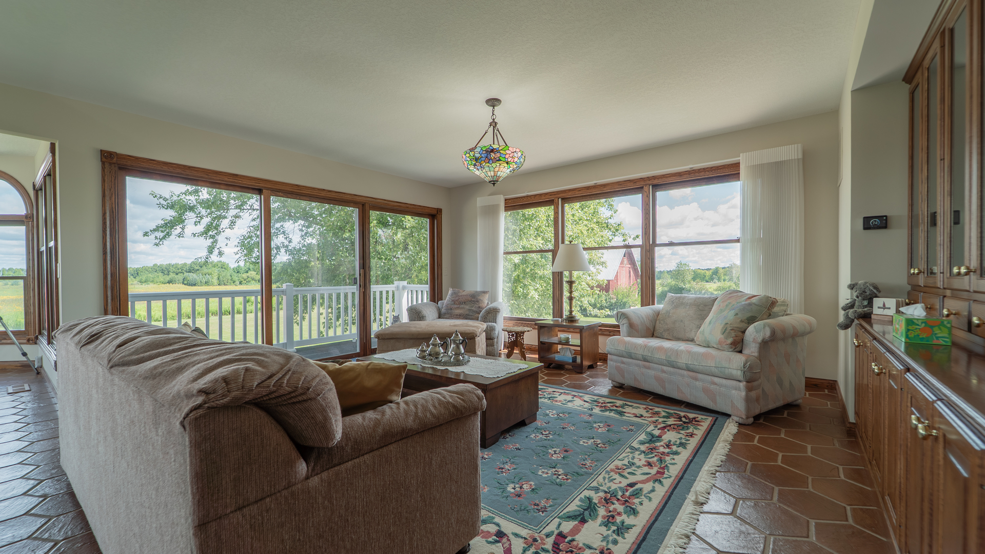 1340 East 2700 North Road Clifton, IL 60927 - Photo 21 of 80 a living room with furniture and a large window