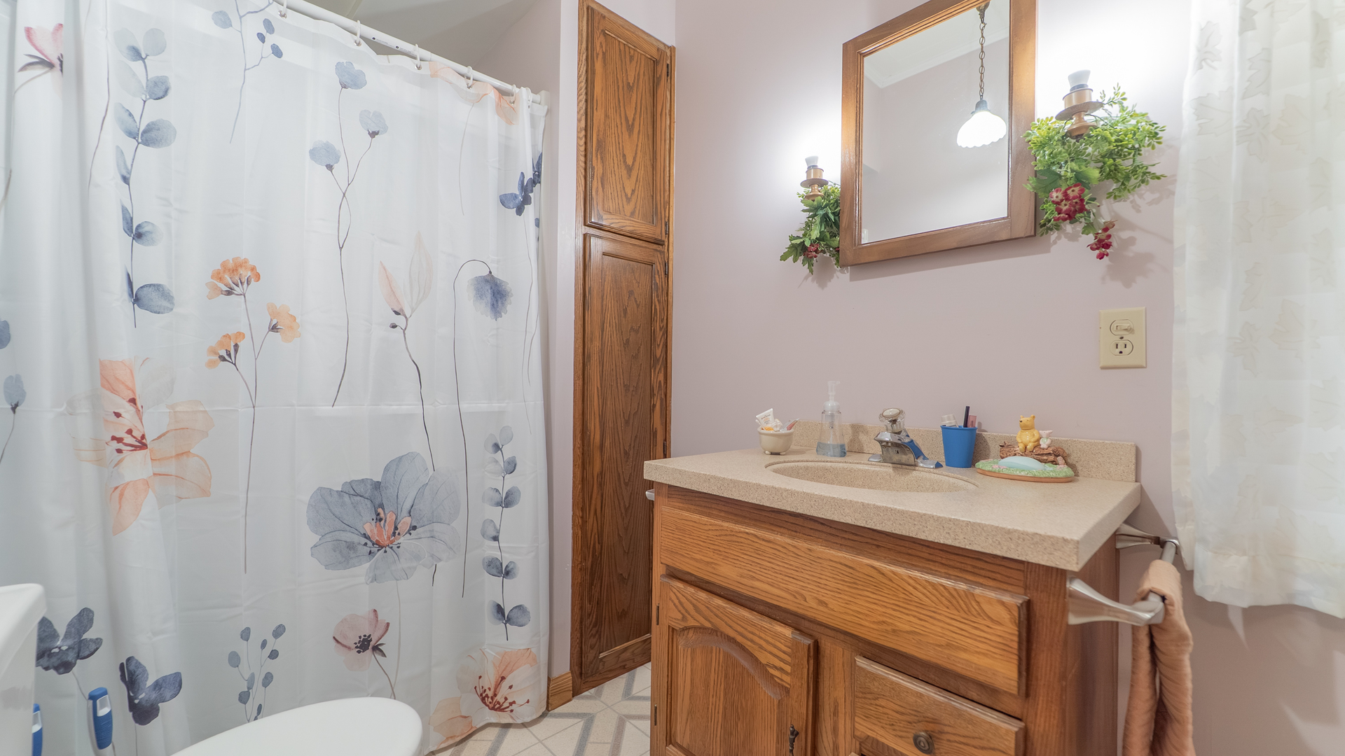 1340 East 2700 North Road Clifton, IL 60927 - Photo 30 of 80 a bathroom with a sink vanity mirror and toilet