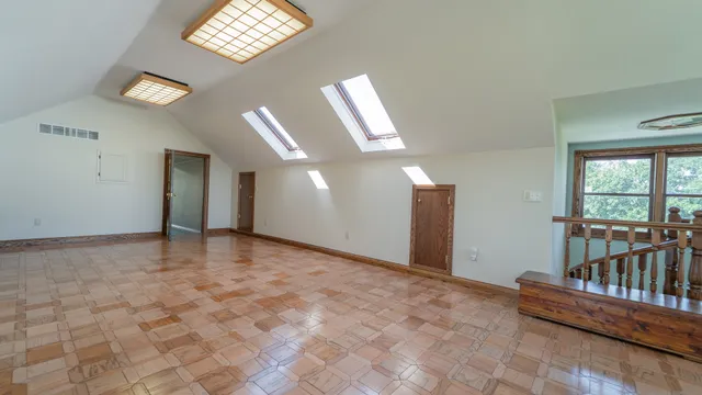 a view of a garage with parked cars