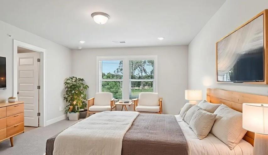 5960 Molo Lane Cumming, GA 30041 - Photo 13 of 17 a living room with furniture and a flat screen tv