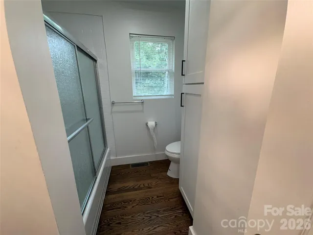 a bathroom with a sink and toilet