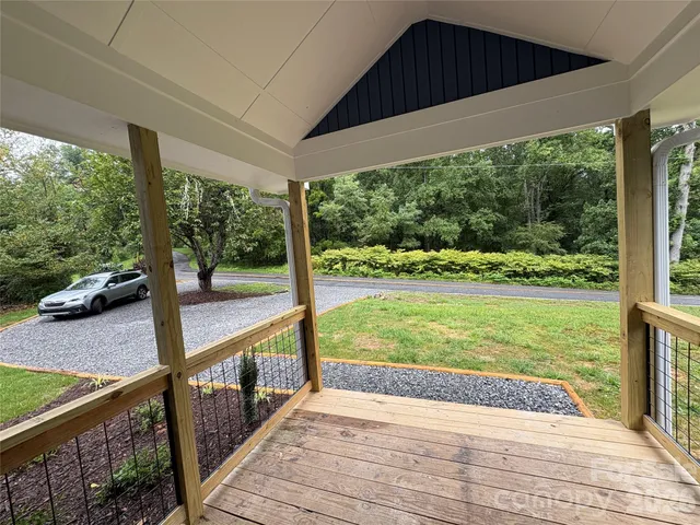 a view of porch with a swimming pool