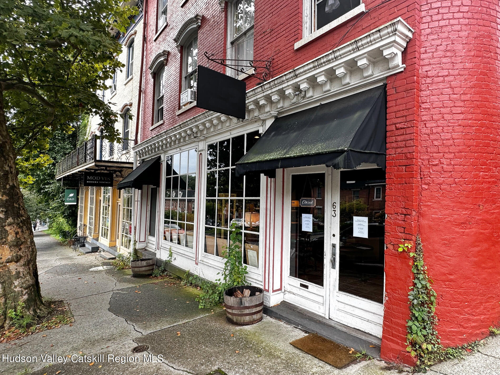 63 Broadway Kingston, NY 12401 - Photo 2 of 23 a front view of a building with street