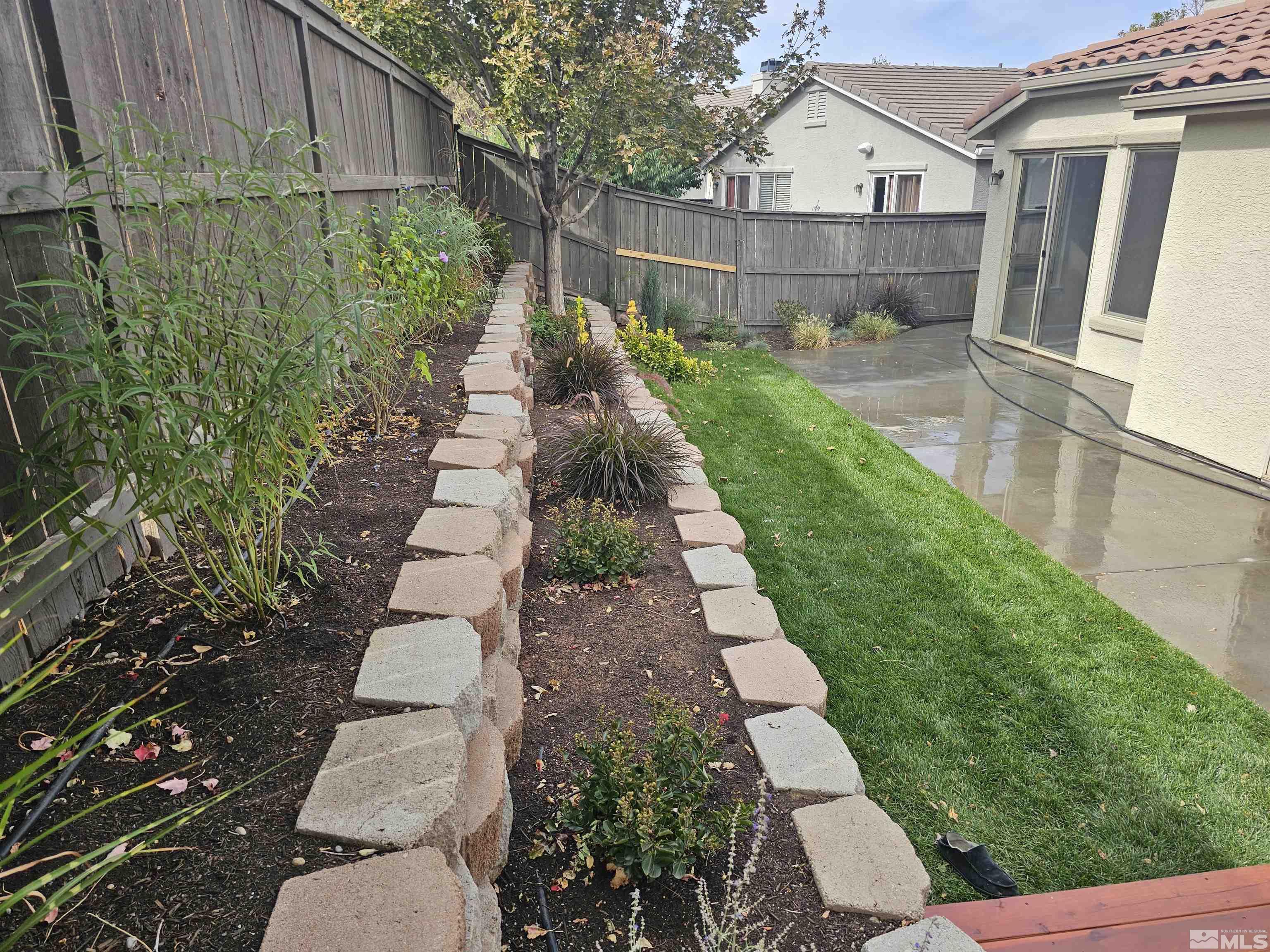 540 Beckfield Court Reno, NV 89521 - Photo 20 of 23 a view of a backyard with pathway
