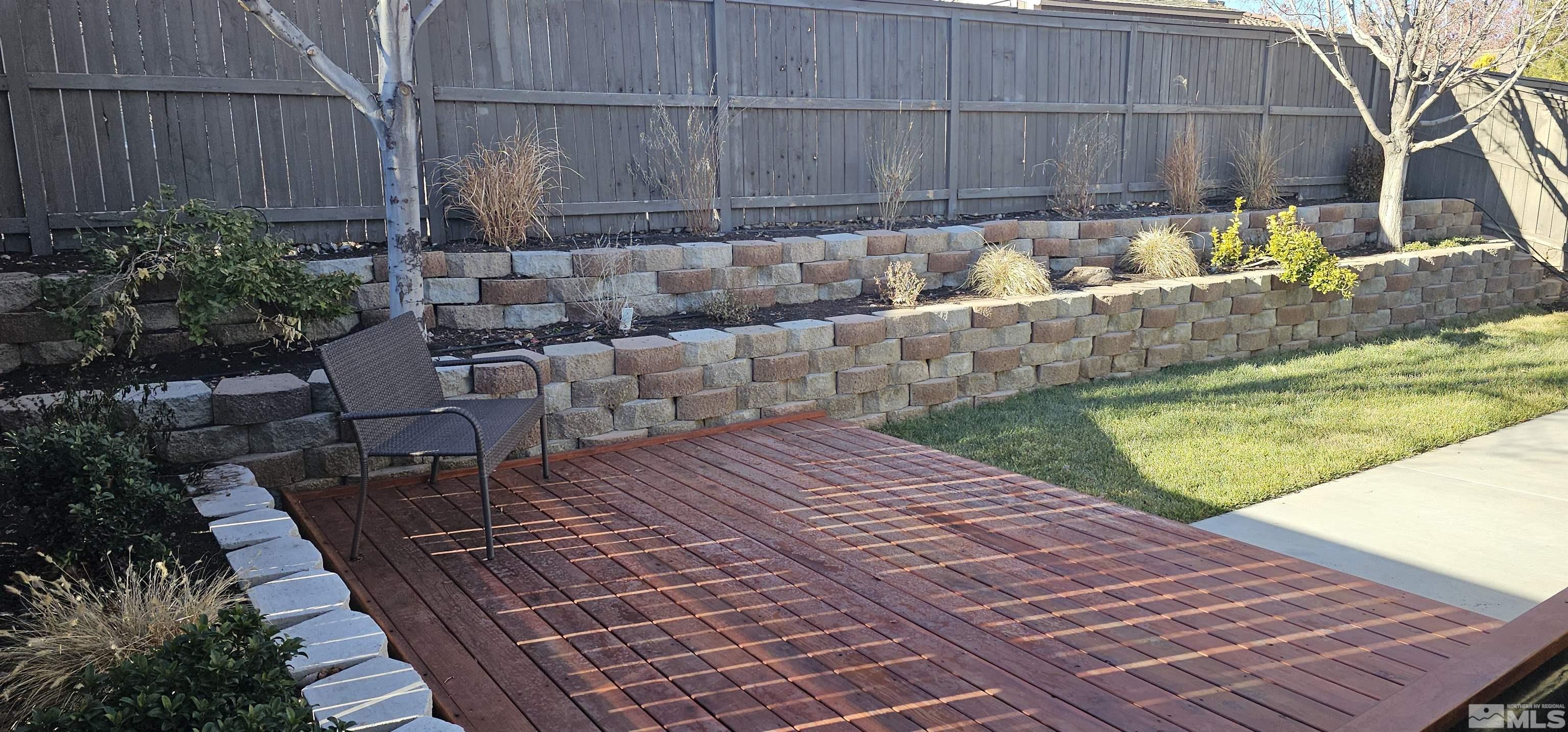 540 Beckfield Court Reno, NV 89521 - Photo 22 of 23 a view of a backyard with sitting area