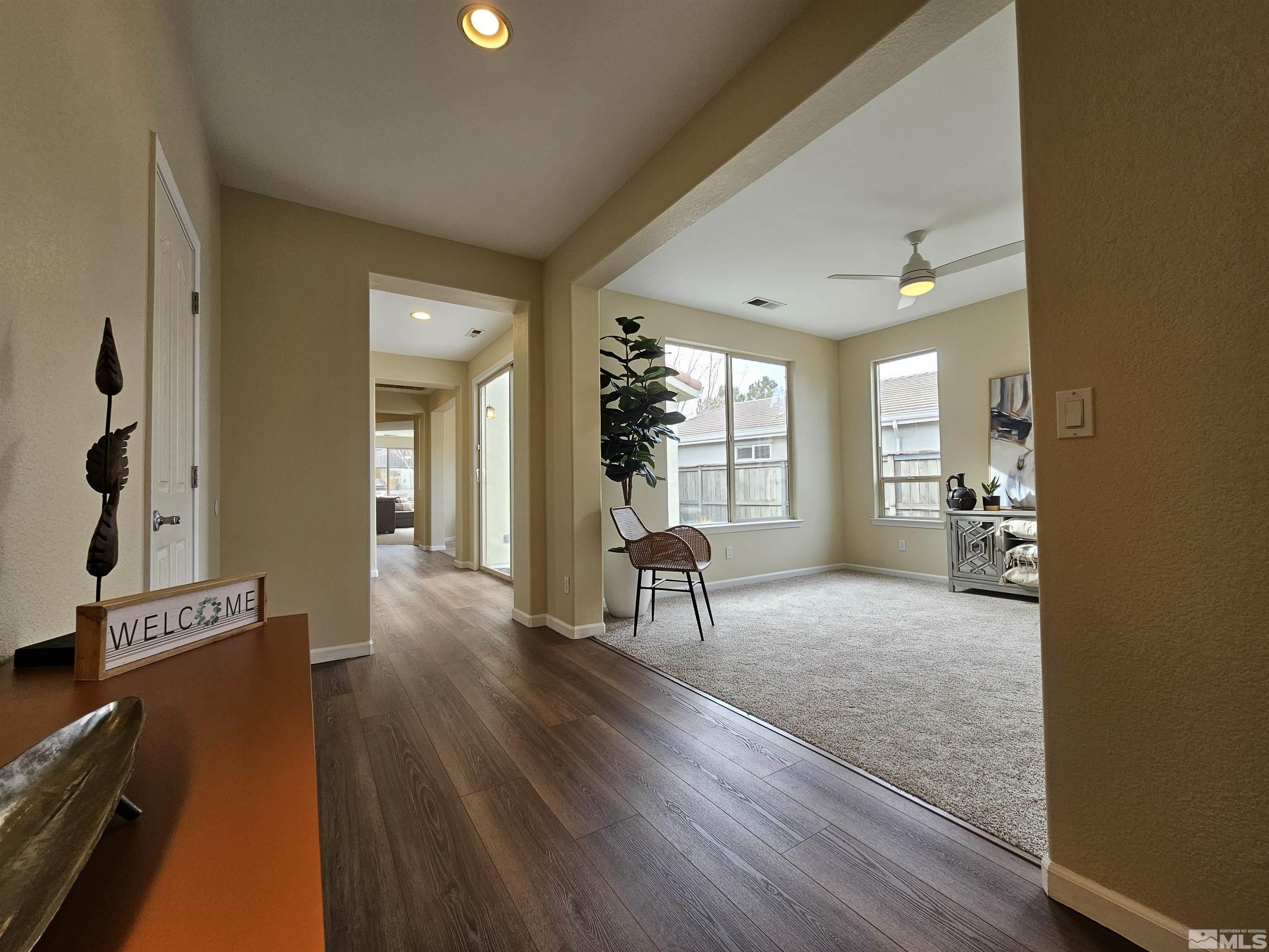540 Beckfield Court Reno, NV 89521 - Photo 5 of 23 a living room with furniture and a wooden floor