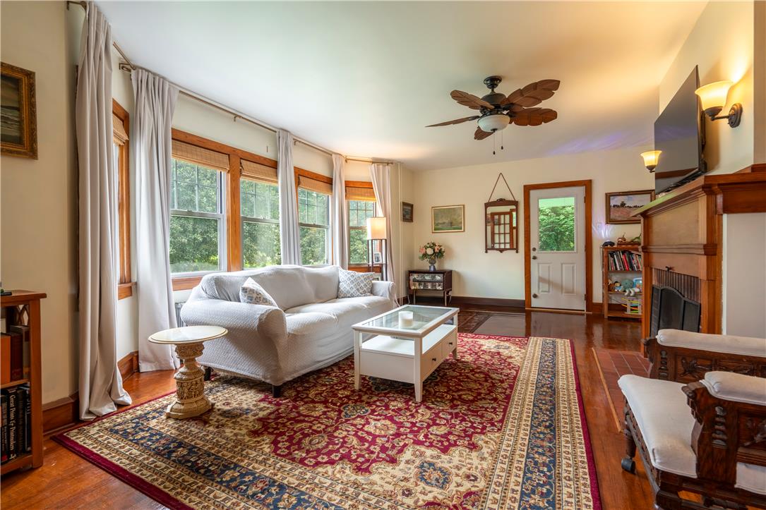 665 Point Phillips Road Bath, PA 18014 - Photo 10 of 73 Hardwood floors and generous natural light define this cozy living space, perfect for relaxation.