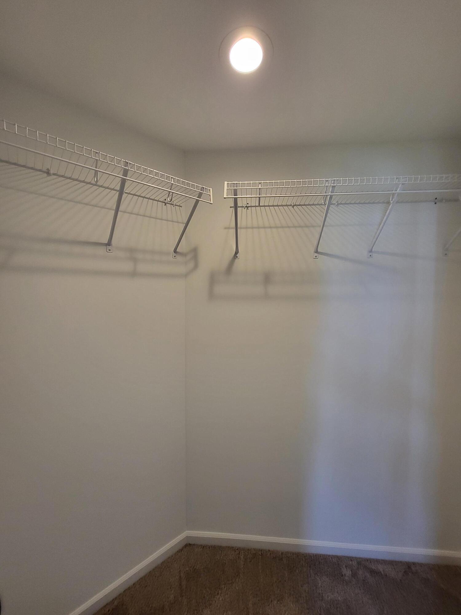 18425 Alexander Avenue Lowell, IN 46356 - Photo 18 of 34 a view of a room with racks on the wall